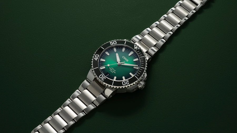 Aquis date calibre 400 40077694157-0782209peb