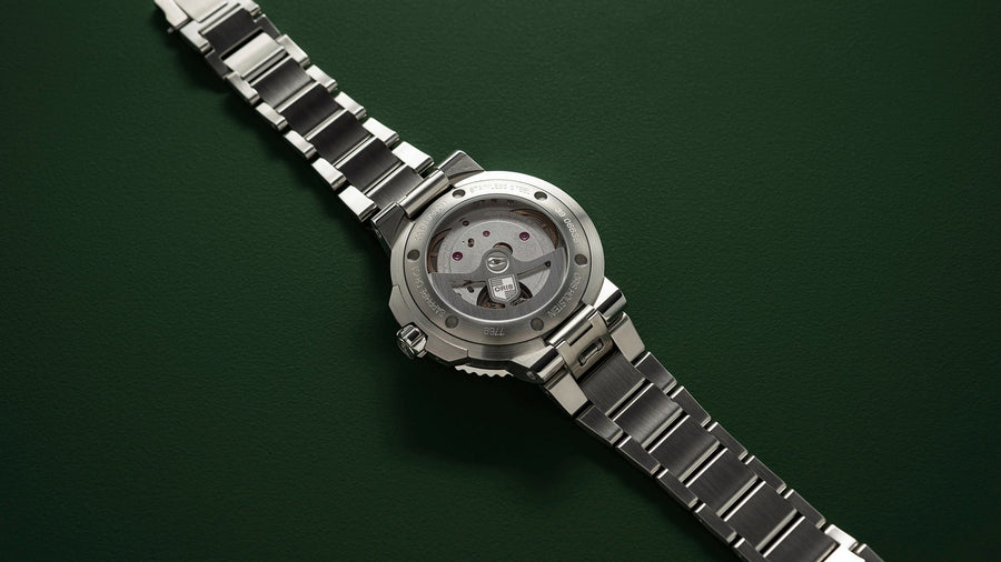 Aquis date calibre 400 40077694157-0782209peb
